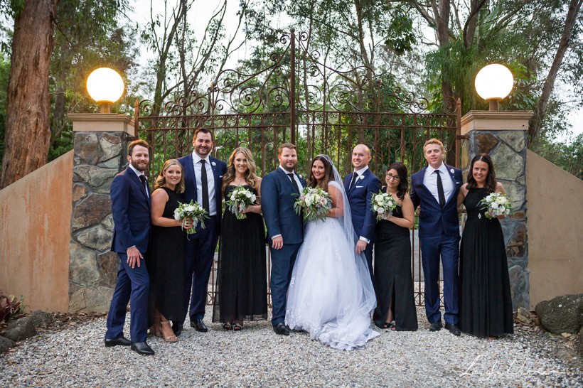 Bridal Party by the gate at Ecostudio Fellini Wedding