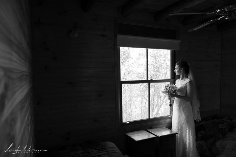 Bride looking out window before Polly's Kitchen Wedding