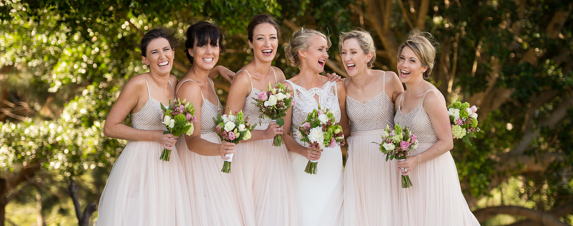 Bride Bridesmaids Laughing